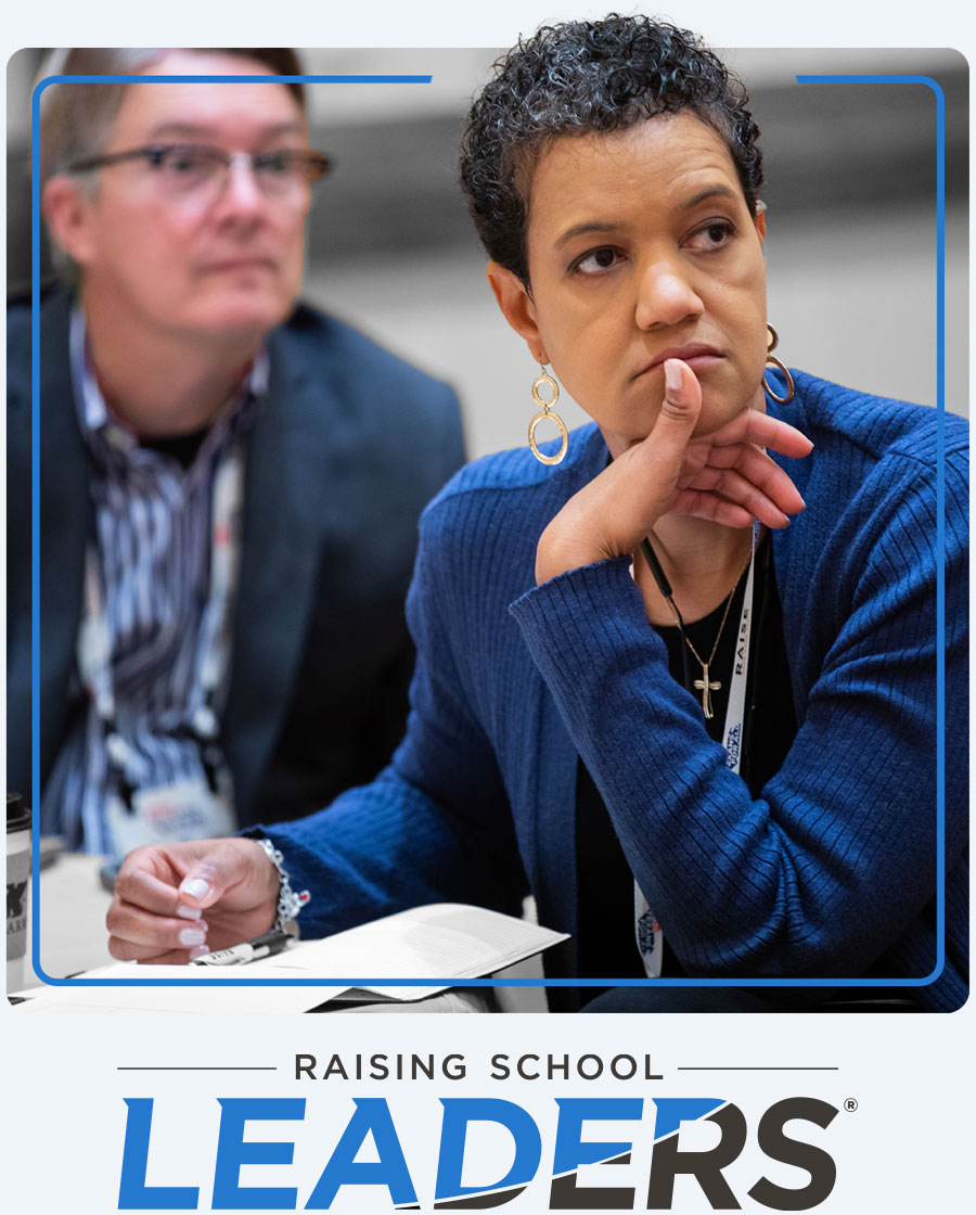 An alumni looks on as she listened to keynote speaker at the Charles Butt Foundation leadreship symposium with the Raising School Leaders statewide program logo appearing below the image.
