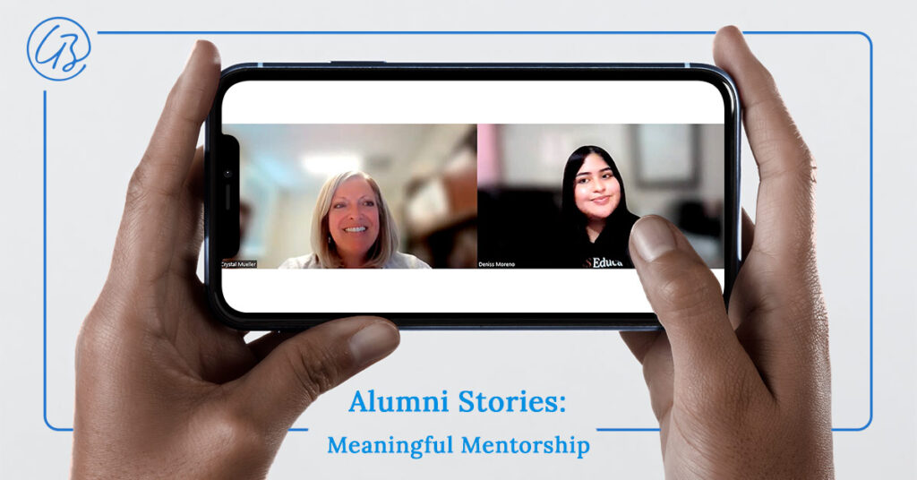 Two hands hold a cell phone as if participating in a conference call. On the screen are two educators calling in from different locations. A title reads "Alumni Stories: Meaningful Mentorship."