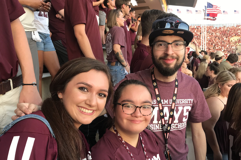 Anna with her Aggie ACHIEVE friends at a football game in College Station