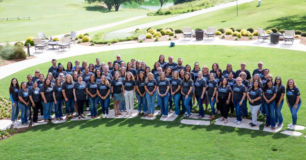 Group photograph of Texas Teachers Collaborative session summer workshop outside